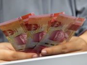 Rupiah Kembali Melemah ! Menyentuh Rp 15.700 Per Dollar AS